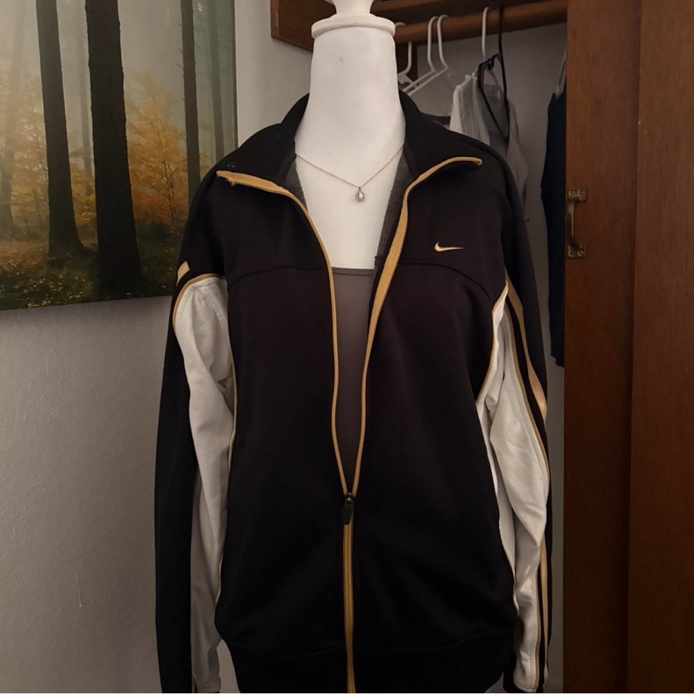 Nike Women’s Black and Gold Jacket